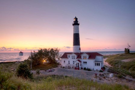 Big Sable Point Lighthouse At Sunset by Adam Romanowicz art print