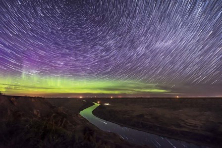 Circumpolar Star Trails and Aurora Over the Red Deer River, Alberta by Alan Dyer/Stocktrek Images art print