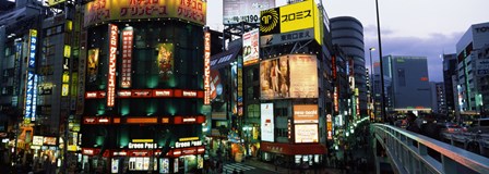 Buildings in a city lit up at night, Shinjuku Ward, Tokyo Prefecture, Kanto Region, Japan by Panoramic Images art print