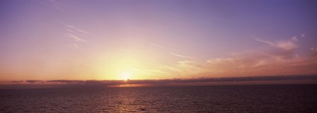 Sun Setting Behind Clouds over the Sea by Panoramic Images art print