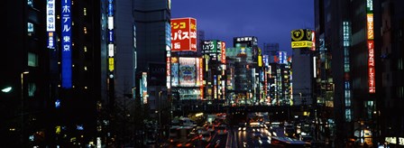 Buildings lit up at night, Shinjuku Ward, Tokyo Prefecture, Kanto Region, Japan by Panoramic Images art print