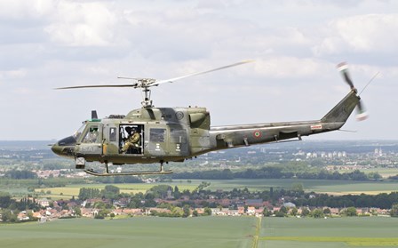 Italian Air Force AB-212 ICO helicopter over France by Giovanni Colla/Stocktrek Images art print