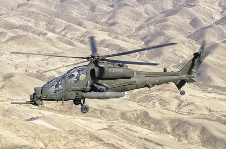 Italian Army AW-129 Mangusta over Afghanistan by Giovanni Colla/Stocktrek Images art print