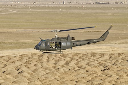 Italian Army AB-205MEP Utility Helicopter Over Shindand, Afghanistan by Giovanni Colla/Stocktrek Images art print