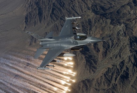 An F-16 Fighting Falcon Releases Flares by HIGH-G Productions/Stocktrek Images art print