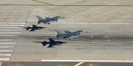 Two F-16&#39;s Land in Formation at Luke Air Force Base, Arizona by HIGH-G Productions/Stocktrek Images art print