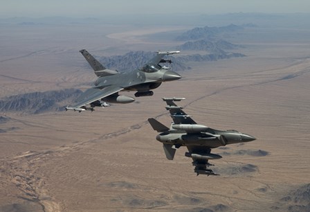 Two F-16&#39;s on a training mission over the Arizona desert by HIGH-G Productions/Stocktrek Images art print