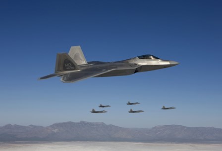 F-22 Raptors Fly in Formation Over New Mexico by HIGH-G Productions/Stocktrek Images art print