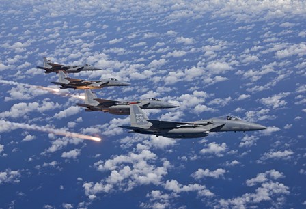 Four F-15 Eagles fly in Formation Over the Pacific Ocean by HIGH-G Productions/Stocktrek Images art print