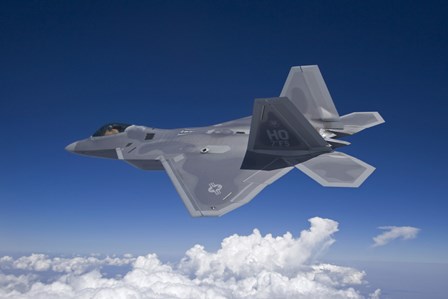 An F-22 Raptor over Southern New Mexico by HIGH-G Productions/Stocktrek Images art print