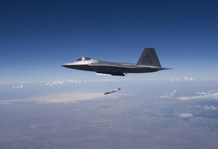 An F-22 Raptor Releases a GBU-32 JDAM over New Mexico by HIGH-G Productions/Stocktrek Images art print