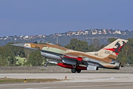 An F-16A Netz of the Israeli Air Force landing at Ramat David Air Force Base by Ofer Zidon/Stocktrek Images art print