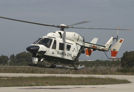 A BK117 utility Helicopter of the Spanish Civil Guard by Timm Ziegenthaler/Stocktrek Images art print