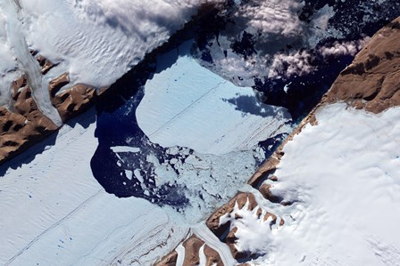A Massive Ice Island Breaks Free of the Petermann Glacier in Greenland by Stocktrek Images art print