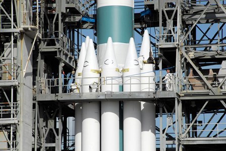 Solid Rocket Boosters are Attached to the Delta II Rocket in the Mobile Service Tower by Stocktrek Images art print