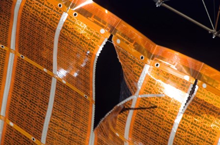 Close-up of a Tear in Solar Array Material on the International Space Station by Stocktrek Images art print