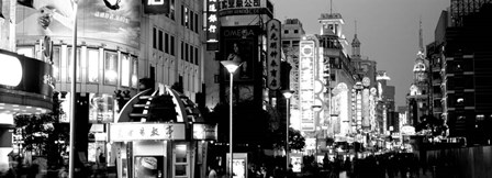 Signboards in a street lit up at dusk, Nanjing Road, Shanghai, China by Panoramic Images art print