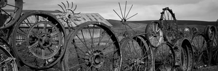 Old barn with a fence made of wheels, Palouse, Whitman County, Washington State by Panoramic Images art print