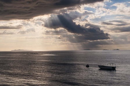 Dramatic light over a little boat, Mamanucas Islands, Fiji, South Pacific by Michael Runkel / DanitaDelimont art print